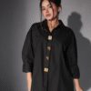 Black oversized shirt dress with gold statement buttons