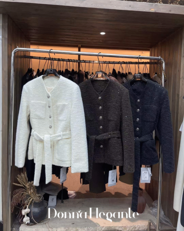 Elegant tweed jackets in white, dark brown, and black, designed to add sophistication and style to any outfit.
