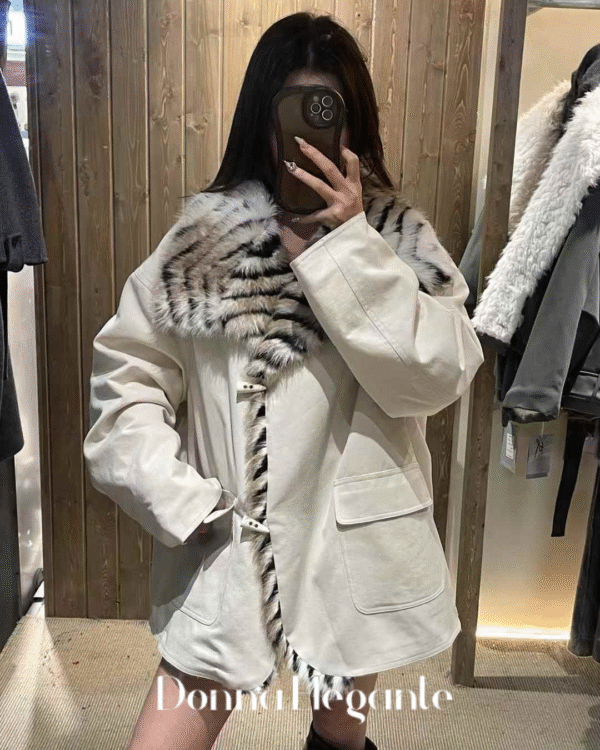 Off-white Faux Fur Winter Jacket with double button closure and belt, perfect for winter fashion.